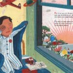 A child sitting in front of a window with a plane flying by.