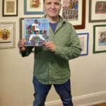 John Parra with Viva Valenzuela book